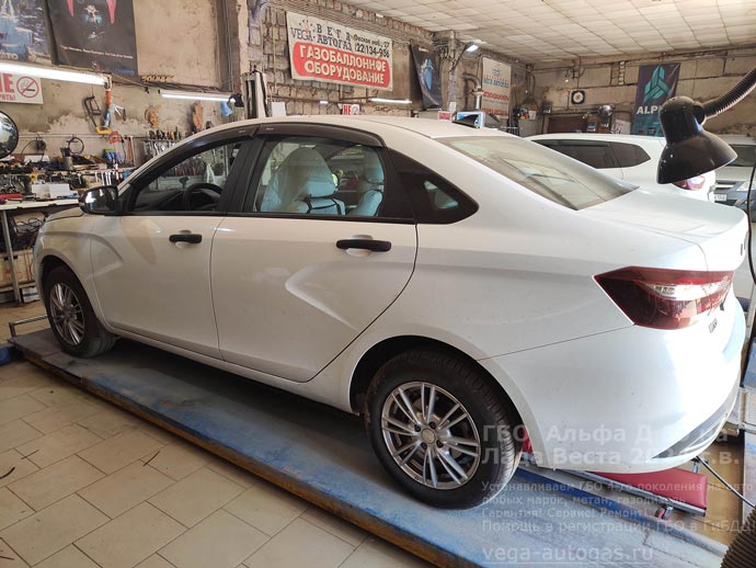 Установка ГБО Альфа Д39 на Ладу Веста, 2024 г.в., 1.6 л., 106 л.с., пробег: 27 409 км., цилиндрический баллон 65 литров в багажнике, за задним рядом сидений, ВЗУ в заднем бампере, с правой стороны, Нижний Новгород, Дзержинск